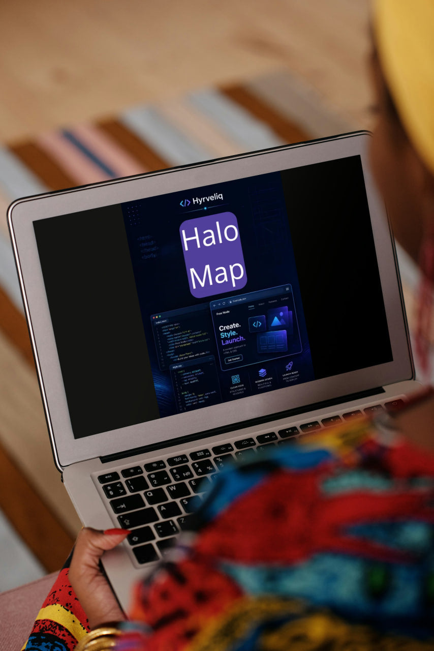Person using a laptop with 'Halo Map' displayed on the screen